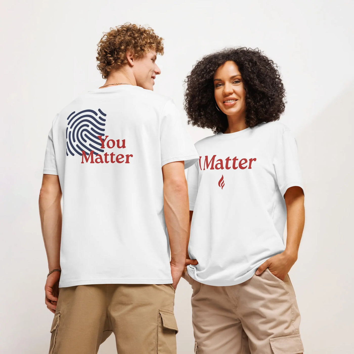Two models wearing white “I Matter” t-shirts from Start Mattering by Passion Struck. Purpose-driven unisex tee designed to inspire intentional living and bold change.